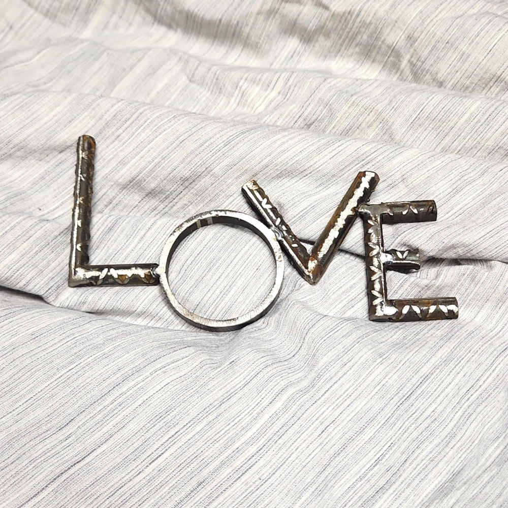 Love sign (metal, welded)